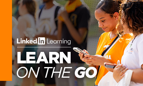 LinkedIn Learning Logo; Learn on the Go; Two young women looking at a cell phone together